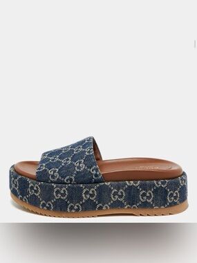 Gucci Angelina platform slide sandals.